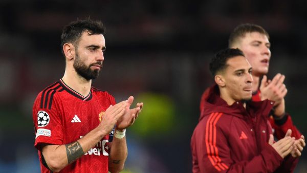 Manchester United's Portuguese midfielder #08 Bruno Fernandes reacts after the UEFA Champions League group A football match between Manchester United and FC Bayern Munich at Old Trafford stadium in Manchester, north west England, on December 12, 2023. (Photo by PETER POWELL / AFP)