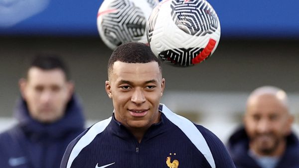 France's forward Kylian Mbappe looks on during a training session as part of the team's preparation for upcoming friendly football matches, in Clairefontaine-en-Yvelines on March 19, 2024. (Photo by FRANCK FIFE / AFP)