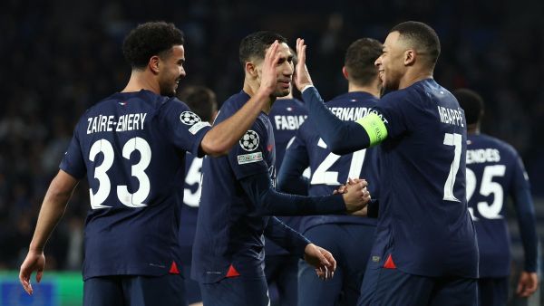 Paris Saint-Germain's French forward #07 Kylian Mbappe celebrates scoring his team's second goal, with teammates, during the UEFA Champions League last 16 second leg football match between Real Sociedad and Paris Saint-Germain (PSG) at the Anoeta stadium in San Sebastian on March 5, 2024. (Photo by FRANCK FIFE / AFP)