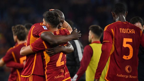 Roma's Belgian midfielder #90 Romelu Lukaku (L) congratulates teammate Roma's Argentine forward #21 Paulo Dybala after winning 3-2 the Italian Serie A football match between AS Roma and Torino on February 26, 2024 at the Olympic stadium in Rome. (Photo by Tiziana FABI / AFP)