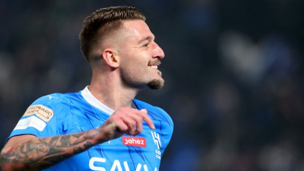 Hilal's Serbian midfielder #22 Sergej Milinkovic-Savic celebrates his goal during the Riyadh Season Cup final match between Al-Nassr and Al-Hilal at the Kingdom Arena in Riyadh, on February 8, 2024. (Photo by Fayez Nureldine / AFP)
