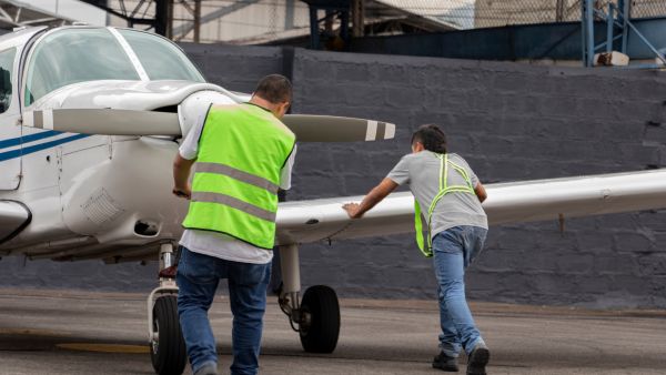 Airport personnel push private jet to start at Cappadocia airport