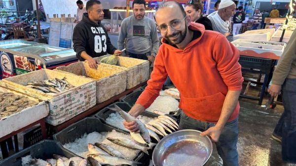 تفسير رؤية بائع السمك في المنام