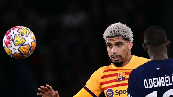 Barcelona's Uruguayan defender #04 Ronald Araujo watches the ball during the UEFA Champions League quarter final first leg football match between Paris Saint-Germain (PSG) and FC Barcelona at the Parc des Princes stadium in Paris on April 10, 2024. (Photo by Miguel MEDINA / AFP)