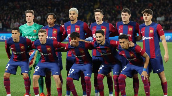 Barcelona players pose for a team photo during the UEFA Champions League last 16 second leg football match between FC Barcelona and SSC Napoli at the Estadi Olimpic Lluis Companys in Barcelona on March 12, 2024. (Photo by LLUIS GENE / AFP)
