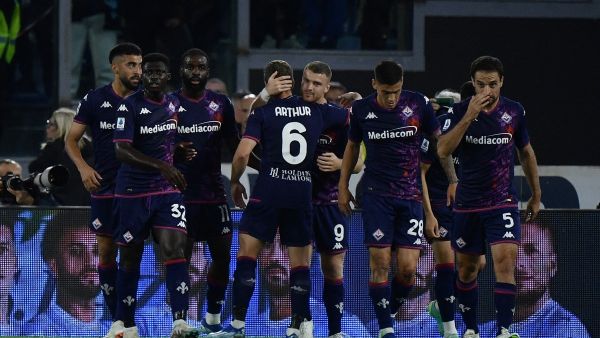 Fiorentina's Argentinian midfielder #09 Lucas Beltran celebrates with teammates after scoring a goal that has been cancelled after VAR review during the Italian Serie A football match between Lazio and Fiorentina at the Olympic stadium in Rome, on October 30, 2023. (Photo by Filippo MONTEFORTE / AFP)