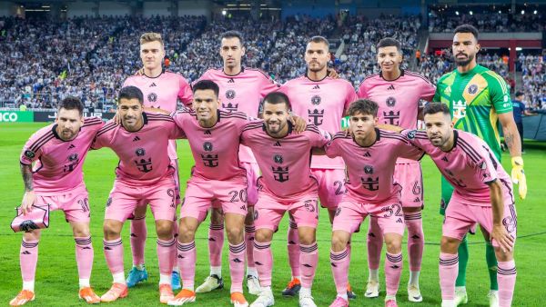 Players of Inter Miami pose for a team photo during the Concacaf Champions Cup quarter-final second-leg football match between Mexico's Monterrey and US' Inter Miami at the BBVA Stadium in Monterrey, Mexico on April 10, 2024. (Photo by Julio Cesar AGUILAR / AFP)