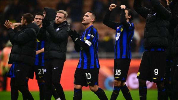 Inter Milan’s forward Lautaro Martinez from Argentina (C) elebrates at the end the Italian Serie A football match Inter Milan vs Udinese on December 9, 2023 at the “San Siro Stadium” in Milan. (Photo by MARCO BERTORELLO / AFP)