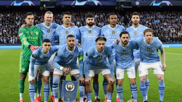 Manchester City players pose for team photo during the UEFA Champions League quarter-final second-leg football match between Manchester City and Real Madrid, at the Etihad Stadium, in Manchester, north-west England, on April 17, 2024. (Photo by Darren Staples / AFP)