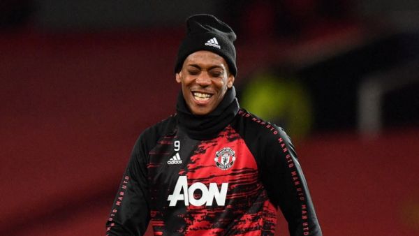 Manchester United's French striker Anthony Martial warms up ahead of the UEFA Champions league group H football match between Manchester United and RB Leipzig at Old Trafford stadium in Manchester, north west England, on October 28, 2020. / AFP / Anthony Devlin
