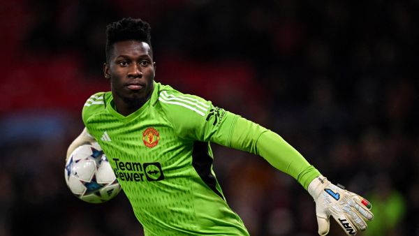 Manchester United's Cameroonian goalkeeper #24 Andre Onana throws the ball during the UEFA Champions League Group A football match between Manchester United and FC Copenhagen at Old Trafford, in Manchester, north-west England, on October 24, 2023. (Photo by Paul ELLIS / AFP)