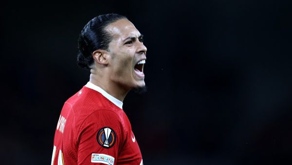 Liverpool's Dutch defender #04 Virgil van Dijk shouts during the UEFA Europa League quarter-final first leg football match between Liverpool and Atalanta at Anfield in Liverpool, north west England on April 11, 2024. (Photo by Darren Staples / AFP)