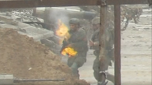 Video: Israeli officer's groin caught on fire after an Al-Qassam sniper pierced him