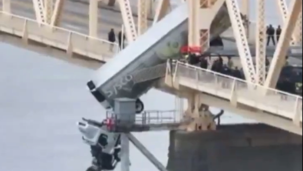  truck hanging off bridge 