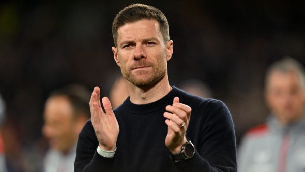 Bayer Leverkusen's Spanish head coach Xabi Alonso applauds fans on the pitch after the UEFA Europa League final football match between Atalanta and Bayer Leverkusen at the Dublin Arena stadium, in Dublin, on May 22, 2024. Atalanta won the game 3-0. (Photo by Glyn KIRK / AFP)