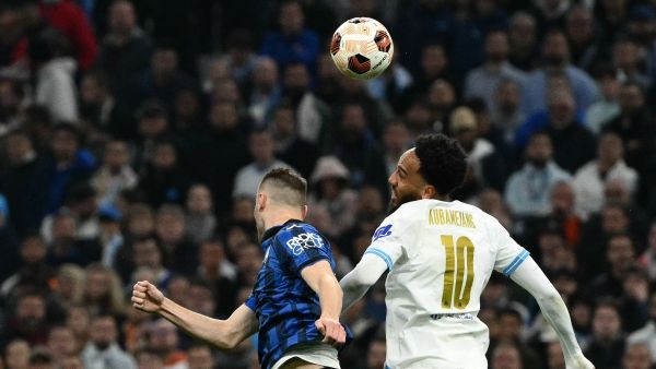 Marseille's French-Gabonese forward #10 Pierre-Emerick Aubameyang (R) and Atalanta's Dutch midfielder #07 Teun Koopmeiners (L) fight for the ball during the UEFA Europa League semi-final first leg football match between Olympique de Marseille (OM) and Atalanta at the Stade Velodrome in Marseille, southern France, on May 2, 2024. (Photo by CHRISTOPHE SIMON / AFP)