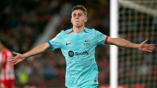 Barcelona's Spanish midfielder #16 Fermin Lopez celebrates scoring the opening goal during the Spanish league football match between UD Almeria and FC Barcelona at the Municipal Stadium of the Mediterranean Games in Almeria on May 16, 2024. (Photo by JORGE GUERRERO / AFP)