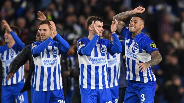 Brighton's players celebrate on the pitch after the UEFA Europa League Group B football match between Brighton and Hove Albion and Marseille at the American Express Community Stadium in Brighton, southern England on December 14, 2023. Brighton won the game 1-0 and top the Group. (Photo by Glyn KIRK / AFP)