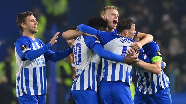 Brighton players celebrate on the final whistle in the UEFA Europa League Group B football match between Brighton and Hove Albion and Marseille at the American Express Community Stadium in Brighton, southern England on December 14, 2023. Brighton won the game 1-0 and top the Group. (Photo by Glyn KIRK / AFP)