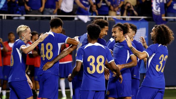 Chelsea's English forward Mason Burstow (2nd L) celebrates scoring his team's first goal during a pre-season friendly football match between Chelsea FC and Borussia Dortmund BVB at Soldier Field in Chicago, Illinois, on August 2, 2023. (Photo by KAMIL KRZACZYNSKI / AFP)
