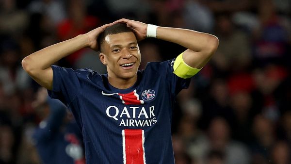 Paris Saint-Germain's French forward #07 Kylian Mbappe reacts after missing a goal opportunity during the French L1 football match between Paris Saint-Germain (PSG) and Toulouse (TFC) on May 12, 2024 at the Parc des Princes stadium in Paris. (Photo by FRANCK FIFE / AFP)