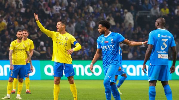 Nassr's Portuguese forward #07 Cristiano Ronaldo (3rd-L) reacts during the Riyadh Season Cup final match between Al-Nassr and Al-Hilal at the Kingdom Arena in Riyadh, on February 8, 2024. (Photo by Fayez Nureldine / AFP)
