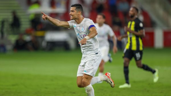 Nassr's Portuguese forward #07 Cristiano Ronaldo celebrates his second goal during the Saudi Pro League football match between Al-Ittihad and Al-Nassr at King Abdullah Sports City Stadium in Jeddah on December 26, 2023. (Photo by AFP)
