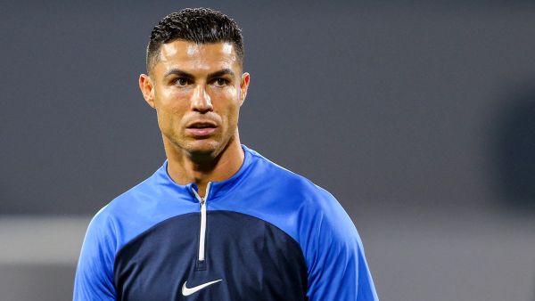 Nassr's Portuguese forward #07 Cristiano Ronaldo looks on as he warms up before the Saudi Pro League football match between Damac FC and Al-Nassr FC at Prince Sultan bin Abdulaziz Sports City stadium in Abha on April 5, 2024. (Photo by Mohammed ALSHEHRI / AFP)