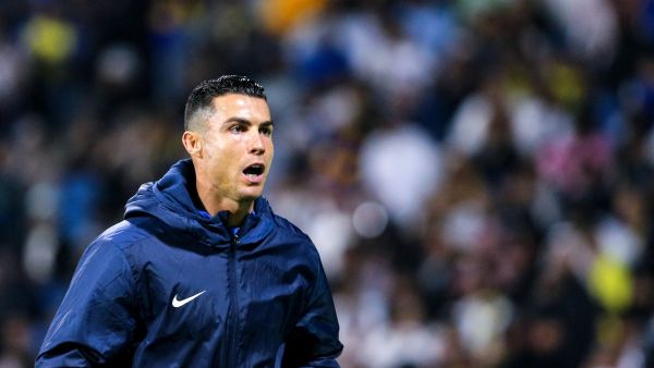 Nassr's Portuguese forward #07 Cristiano Ronaldo reacts while warming up during the Saudi Pro League football match between Damac FC and Al-Nassr FC at Prince Sultan bin Abdulaziz Sports City stadium in Abha on April 5, 2024. (Photo by Mohammed ALSHEHRI / AFP)