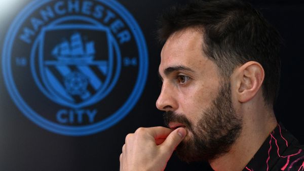 Manchester City's Portuguese midfielder #20 Bernardo Silva attends a press conference at Manchester City's training ground in north-west England on April 16, 2024, on the eve of their UEFA Champions League Group quarter-final second-leg football match against Real Madrid. (Photo by Oli SCARFF / AFP)