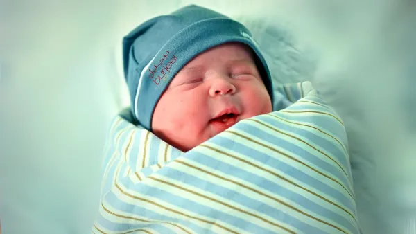 Baby Humam, born to Jordanian parents, arrived exactly at 12:00 AM on the special day