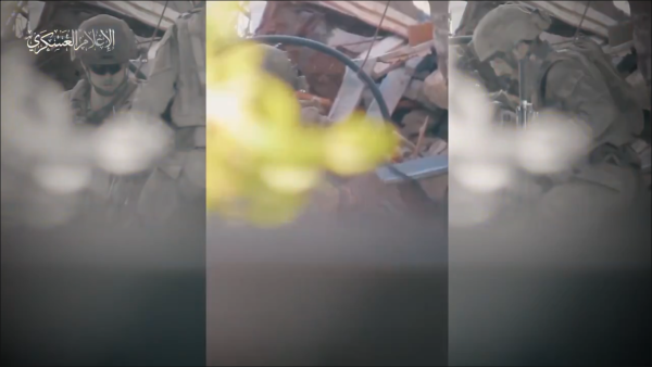Al-Qassam targets and takes down two soldiers with a single bullet.