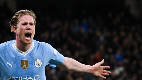 Manchester City's Belgian midfielder #17 Kevin De Bruyne celebrates after scoring his team first and equalising goal during the UEFA Champions League quarter-final second-leg football match between Manchester City and Real Madrid, at the Etihad Stadium, in Manchester, north-west England, on April 17, 2024. (Photo by Paul ELLIS / AFP)