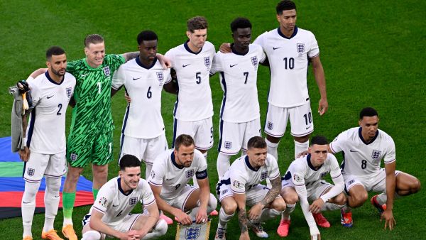 England's players pose for a team picture during the UEFA Euro 2024 Group C football match between Serbia and England at the Arena AufSchalke in Gelsenkirchen on June 16, 2024. (Photo by INA FASSBENDER / AFP)