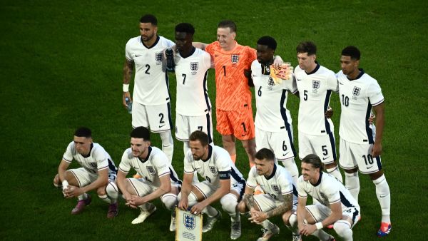 England's players pose for a team photo ahead of kick-off in the UEFA Euro 2024 Group C football match between England and Slovenia at the Cologne Stadium in Cologne on June 25, 2024. (Photo by Angelos Tzortzinis / AFP)