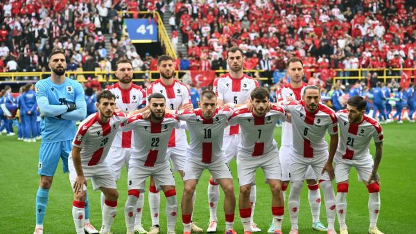 Georgia's players pose for a group photograph before the start of the UEFA Euro 2024 Group F football match between Turkey and Georgia at the BVB Stadion in Dortmund on June 18, 2024. (Photo by Alberto PIZZOLI / AFP)