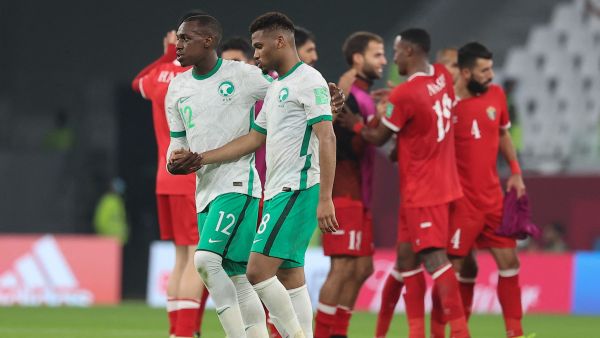 Saudi's defender Saud Abdulhamid (C-L) and Saudi's midfielder Ayman Yahya (C-R) react to their defeat in the FIFA Arab Cup 2021 group C football match between Saudi Arabia and Jordan at the Education City Stadium in the Qatari city of Ar-Rayyan on December 1, 2021. (Photo by KARIM JAAFAR / AFP)
