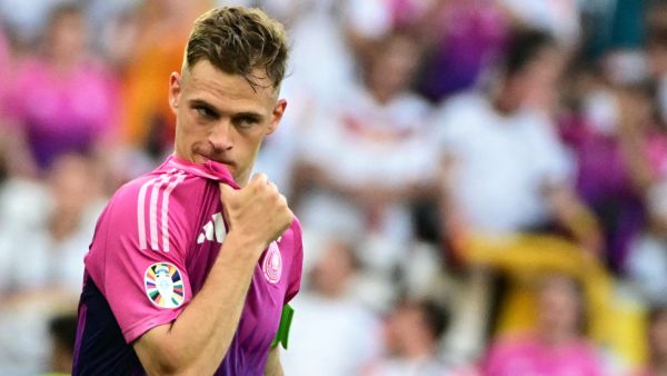 Germany's defender #06 Joshua Kimmich celebrates after winning the UEFA Euro 2024 Group A football match between Germany and Hungary at the Stuttgart Arena in Stuttgart on June 19, 2024. (Photo by Tobias SCHWARZ / AFP)