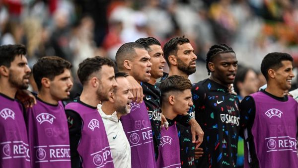 Portugal's players listen to the national anthem before the start of the international friendly football match between Portugal and Croatia at Jamor stadium in Oeiras on June 8, 2024. (Photo by PATRICIA DE MELO MOREIRA / AFP)
