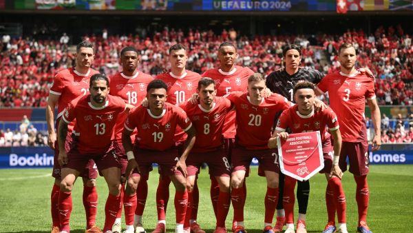 Switzerland players pose for the team photo prior to the UEFA Euro 2024 Group A football match between Hungary and Switzerland at the Cologne Stadium in Cologne on June 15, 2024. (Photo by Angelos Tzortzinis / AFP)
