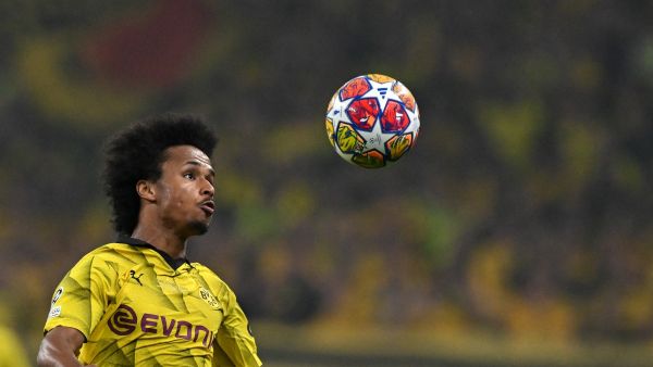 Dortmund's German forward #27 Karim Adeyemi heads the ball during the UEFA Champions League final football match between Borussia Dortmund and Real Madrid, at Wembley stadium, in London, on June 1, 2024. (Photo by Glyn KIRK / AFP)