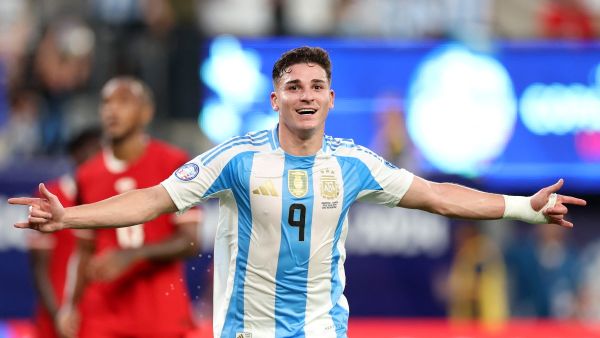 Argentina's forward #09 Julian Alvarez celebrates scoring his team's first goal during the Conmebol 2024 Copa America tournament semi-final football match between Argentina and Canada at MetLife Stadium, in East Rutherford, New Jersey on July 9, 2024. (Photo by CHARLY TRIBALLEAU / AFP)