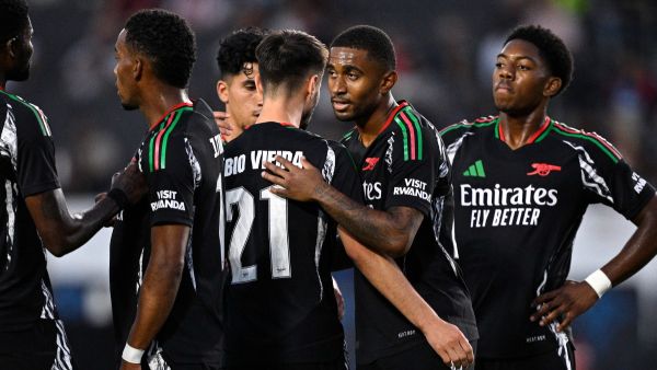 Fabio Vieira #21 of Arsenal FC is congratulated by teammates after scoring a goal against AFC Bournemouth during the first half at Dignity Health Sports Park on July 24, 2024 in Carson, California. Orlando Ramirez/Getty Images/AFP (Photo by Orlando Ramirez / GETTY IMAGES NORTH AMERICA / Getty Images via AFP)