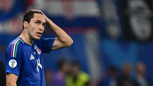 Italy's forward #14 Federico Chiesa reacts during the UEFA Euro 2024 Group B football match between Croatia and Italy at the Leipzig Stadium in Leipzig on June 24, 2024. (Photo by GABRIEL BOUYS / AFP)