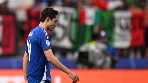 Italy's forward #14 Federico Chiesa reacts at the end of the UEFA Euro 2024 round of 16 football match between Switzerland and Italy at the Olympiastadion Berlin in Berlin on June 29, 2024. (Photo by Kirill KUDRYAVTSEV / AFP)