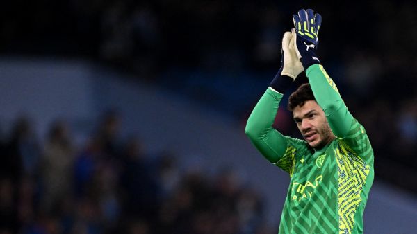 Manchester City's Brazilian goalkeeper #31 Ederson applauds the fans following the UEFA Champions League Group B second leg football match between Manchester City and Young Boys at the Etihad Stadium in Manchester, north west England, on November 7, 2023. (Photo by Oli SCARFF / AFP)