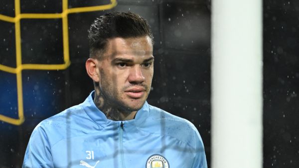 Manchester City's Brazilian goalkeeper #31 Ederson looks on during a warm-up session prior the UEFA Champions League Group G football match between Young Boys (SUI) and Manchester City (ENG) at The Wankdorf Stadium, in Bern on October 25, 2023. (Photo by Fabrice COFFRINI / AFP)