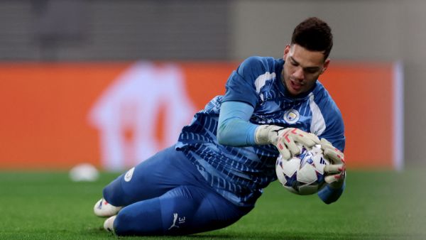 Manchester City's Brazilian goalkeeper #31 Ederson warms up prior to the UEFA Champions League Group G football match between RB Leipzig and Manchester City in Leipzig, eastern Germany on October 4, 2023. (Photo by Ronny HARTMANN / AFP)