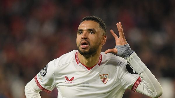 Sevilla's Moroccan forward #15 Youssef En-Nesyri celebrates scoring the second goal during the UEFA Champions League first round group B football match between Sevilla FC and PSV Eindhoven at the Ramon Sanchez Pizjuan stadium in Seville on November 29, 2023. (Photo by JORGE GUERRERO / AFP)