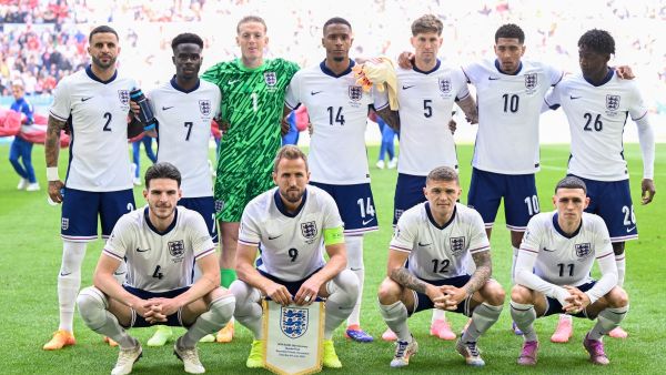 England's players pose for the group photo at the start of the UEFA Euro 2024 quarter-final football match between England and Switzerland at the Duesseldorf Arena in Duesseldorf on July 6, 2024. (Photo by INA FASSBENDER / AFP)